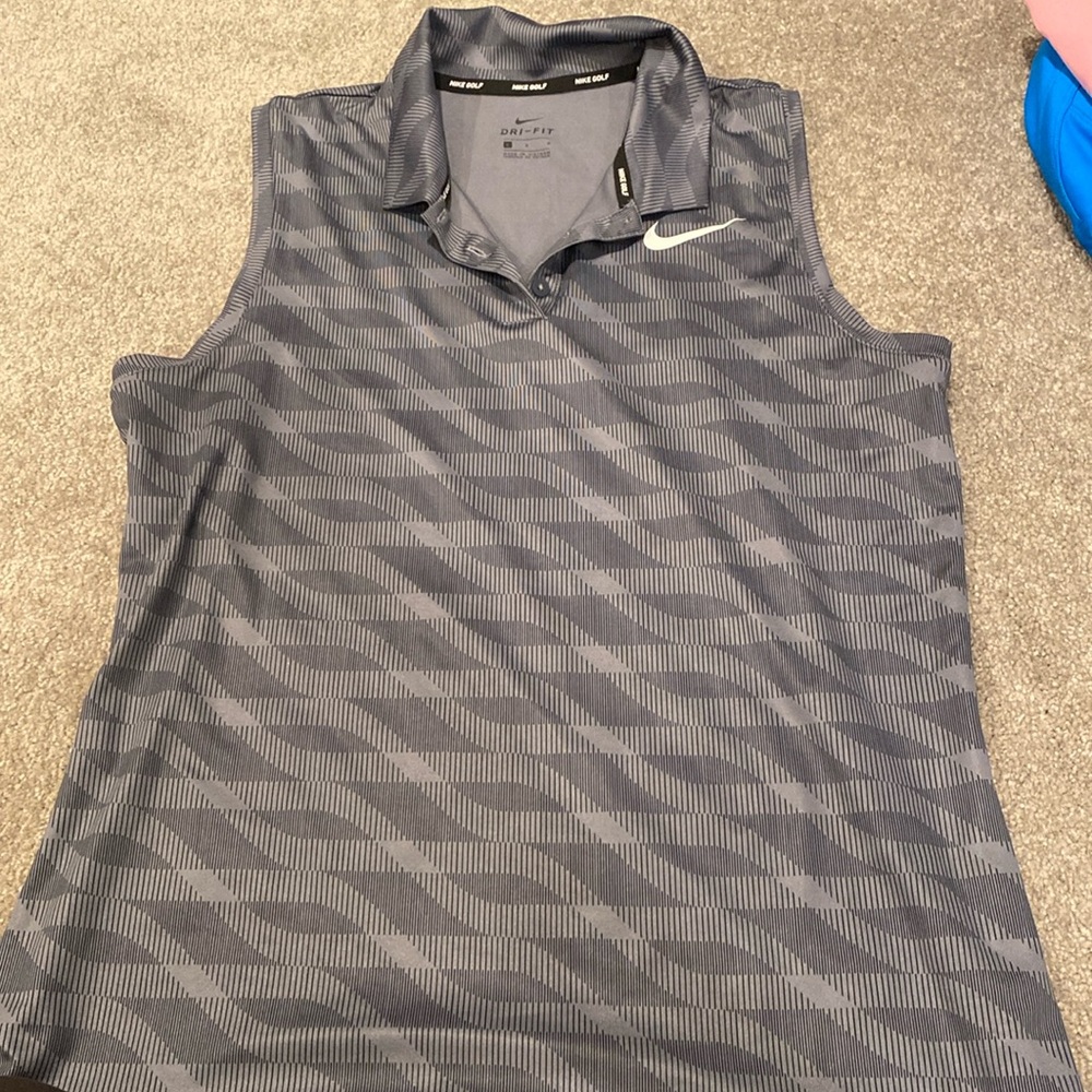 Women’s size large, collared, golf shirt, Nike